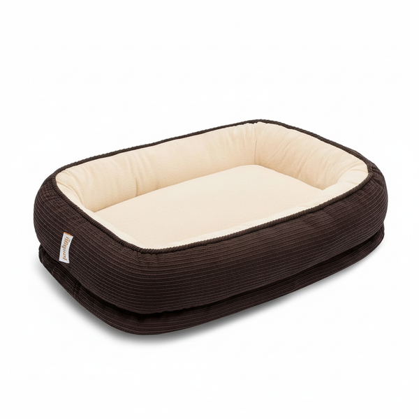 Empty brown corduroy pet bed