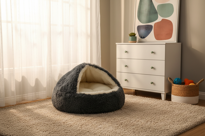 Hooded cave dog bed in stylish bedroom nook