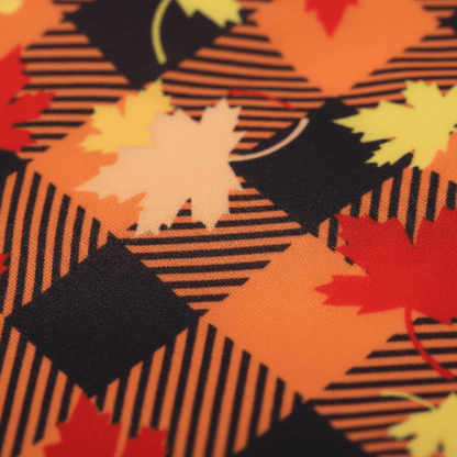 Autumn Plaid Puppy Dress – Maple Style fabric detail featuring orange and yellow maple leaves.